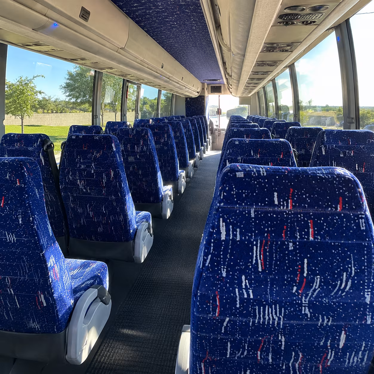 tamarac 56 passenger charter bus inside